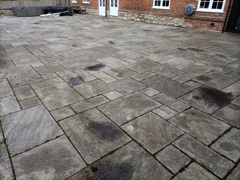 algae-staining-sandstone-patio-before-cleaning-Bearsted